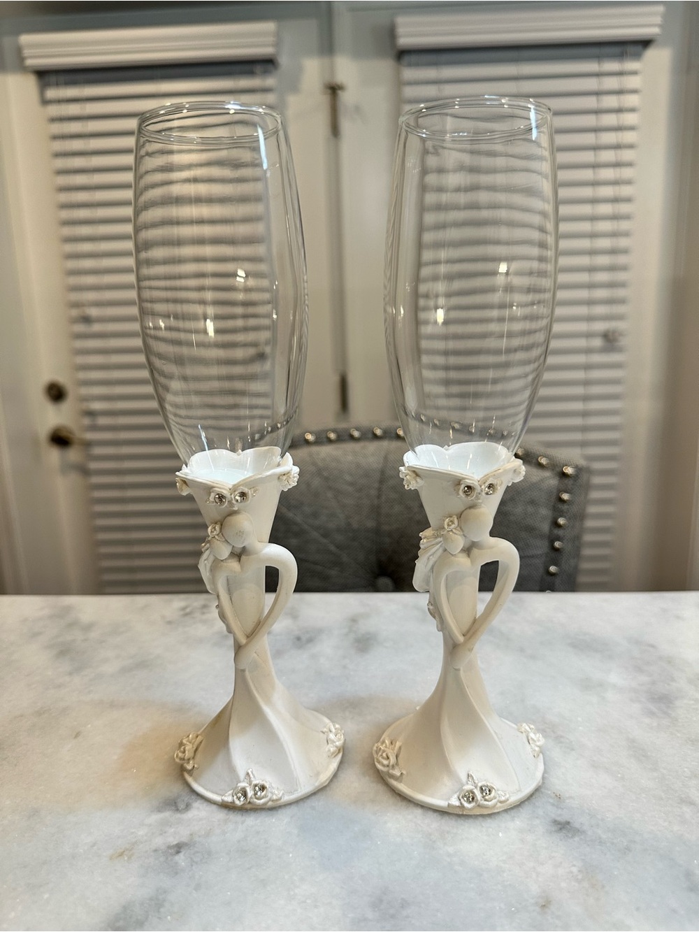 White Wedding Champagne Flutes w/ Unique Figural Base Decorated Crystal Accent